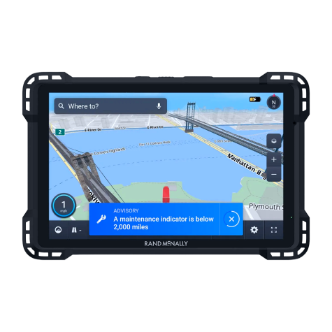 Rand McNally GPS device showing a navigation map with a maintenance alert advisory, indicating a service requirement in less than 2,000 miles.