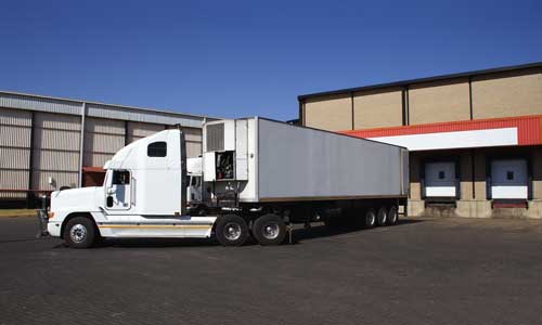 Long haul truck loading in dock